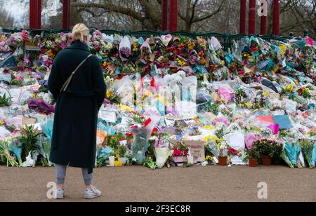London, UK. 16th Mar, 2021. People continue to leave tributes and flowers for Sarah Everard at the bandstand on Clapham Common which has become a shrine. Sarah was last seen on March 3rd. Her body was found in a builders' bag in Woodland at Ashord. PC Wayne Couzens appeared at the Old Bailey via videolink from Belmarsh prison today. He will go on trial in October. Credit: Mark Thomas/Alamy Live News
