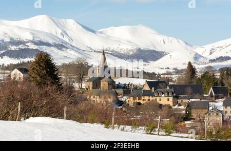 Massif of Sancy and Saint-victor la Riviere village in Regional natural park of the volcanoes of Auvergne in winter, Puy de Dome. Auvergne-Rhone-Alpes Stock Photo