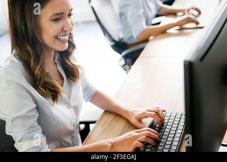 Programmer working in a software developing company Stock Photo