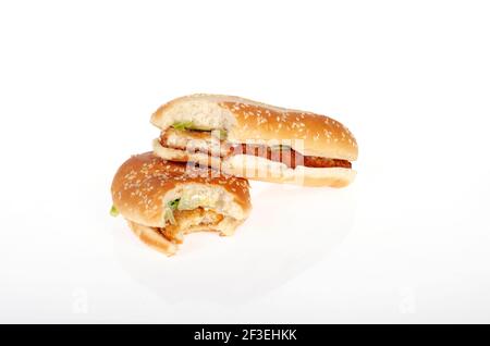 Burger King Original Chicken & Chicken Jr. Sandwiches with Bite Taken Stock Photo