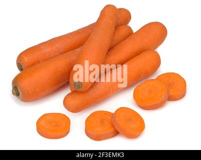 Washed carrots and carrot slices isolated on white background Stock Photo