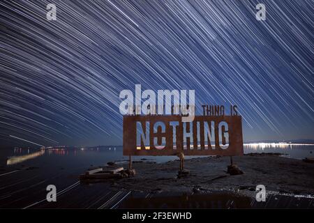Nothing Sign Star Trails in the Salton Sea, California USA Stock Photo