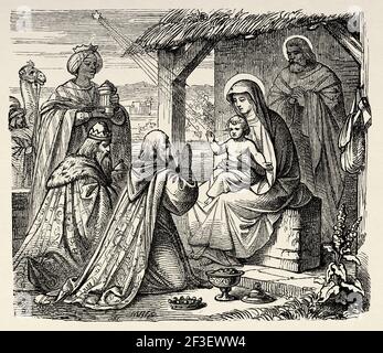 The adoration of the three magi. The three wise men or kings visiting newborn Jesus in Bethlehem and giving him gifts. Matthew 2. New Testament, Old 19th century engraved illustration from History of the Bible 1883 Stock Photo