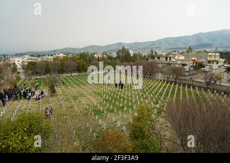 Halabja, Iraq. 16th Mar, 2021. A view of the grave yard where the victims of the Halabja chemical attack were buried.The 33rd anniversary of the chemical attack carried out by the Iraqi government on March 16, 1988 on the city of Halabja in the Kurdistan Region, which killed nearly 5000 people and injured 10000 most of them civilians. Thousands of the city's residents died in the year following the attack due to health complications and due to diseases and birth defects. (Photo by Ismael Adnan/SOPA Images/Sipa USA) Credit: Sipa USA/Alamy Live News Stock Photo