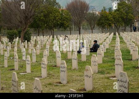 Halabja, Iraq. 16th Mar, 2021. A view of the grave yard where the victims of the Halabja chemical attack were buried.The 33rd anniversary of the chemical attack carried out by the Iraqi government on March 16, 1988 on the city of Halabja in the Kurdistan Region, which killed nearly 5000 people and injured 10000 most of them civilians. Thousands of the city's residents died in the year following the attack due to health complications and due to diseases and birth defects. (Photo by Ismael Adnan/SOPA Images/Sipa USA) Credit: Sipa USA/Alamy Live News Stock Photo