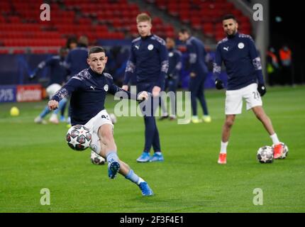 Soccer Football - Champions League - Round of 16 Second Leg - Manchester City v Borussia Moenchengladbach - Puskas Arena, Budapest, Hungary - March 16, 2021  Manchester City's Phil Foden during the warm up before the match REUTERS/Bernadett Szabo