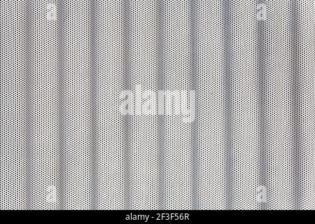 white metal surface with multiple small holes Stock Photo