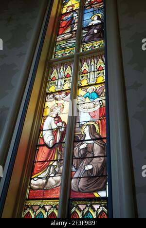 SOUTH BEND, UNITED STATES - Feb 03, 2009: A stained glass window inside the Basilica of the Sacred Heart Cathedral on the campus of the University of Stock Photo