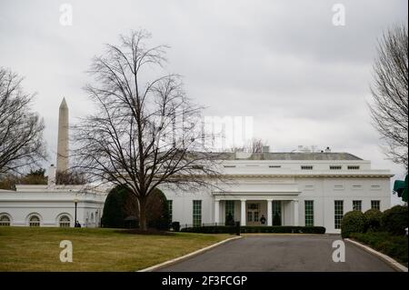 Washington, DC, USA. 16th Mar, 2021. The West Wing of the White House is seen in Washington, DC, U.S., on Tuesday, March 16, 2021. Biden, traveling to Pennsylvania today, is fanning out across the country along with the Vice President and their spouses to highlight Americans receiving stimulus checks and coronavirus vaccines, as well as businesses that have been able to stay afloat with government loans. Credit: Erin Scott/Pool via CNP | usage worldwide Credit: dpa/Alamy Live News Stock Photo