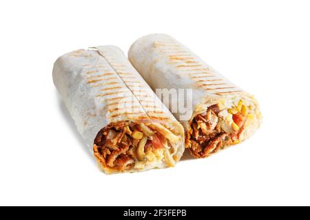 Two parts of Eastern cheesy shawarma with layers of chicken meat, cucumber, cabbage, cheese served on plate, isolated on white background. Turkish don Stock Photo