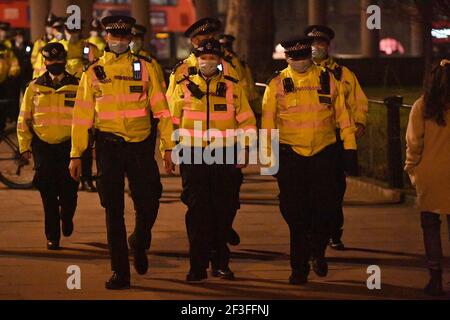 Police officers in London, during a demonstration against gender violence following the murder of Sarah Everard. Picture date: Tuesday March 16, 2021. Stock Photo