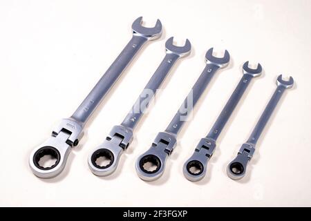 Open-end ratchet wrenches. Accessories for mechanics carrying out repairs in the household. Light background. Stock Photo