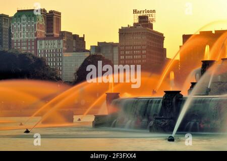Chicago, Illinois, USA. Color fills the sky and is injected in the water spraying from Buckingham Fountain. Stock Photo