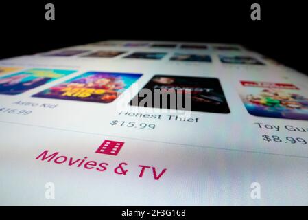 Close-up view of movies for sale in Google Play Store Stock Photo