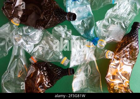 Empty squeezed plastic bottles ready for recycling. Crushed water containers Stock Photo