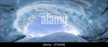 Beautiful View of the Ice Cave in the Alpines Stock Photo