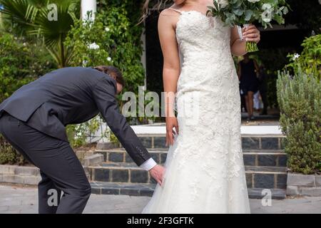 Newly wed couple having a candid moment Stock Photo