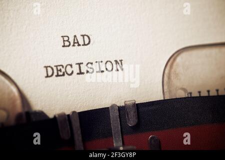 Bad decision  phrase written with a typewriter. Stock Photo