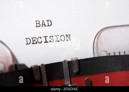 Bad decision  phrase written with a typewriter. Stock Photo