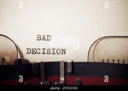 Bad decision  phrase written with a typewriter. Stock Photo