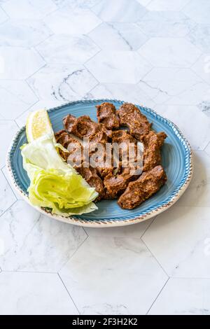 Cig kofte, a raw meat dish in Turkish and Armenian cuisines.  Traditional Food. Stock Photo