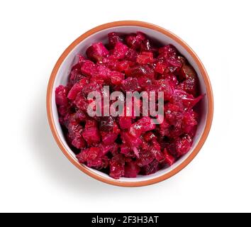 bowl of beet root vegetable salad with oil isolated on white background, top view Stock Photo