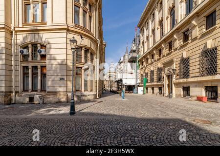 The intersection of Stavropoleos and Poștei streets in the Lipscani district in the historic center of Bucharest, Romania on a sunny day Stock Photo