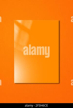 Orange booklet cover isolated on colorful background, mockup template Stock Photo