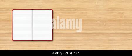 Red open lined notebook mockup isolated on wooden background. Horizontal banner Stock Photo