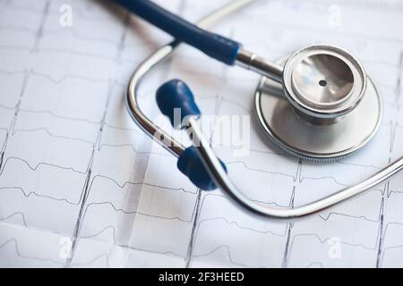 Medical concept. Cardiogram with stethoscope selective focus closeup background with copyspace. Stock Photo