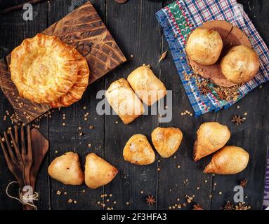 Variety of uzbek national baked samsa pies Stock Photo