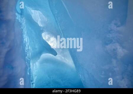 Frozen mountain waterfall with icicles texture close up Stock Photo