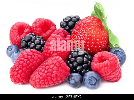 Berries collection isolated on white background. Fresh mix berry set isolate composition, raspberry, blackberry, blueberry, strawberry. Berries macro Stock Photo