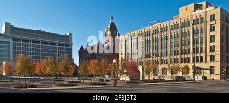 View over Founder's Plaza with autumnal trees towards JFK Memorial Plaza and the Old Red Courthouse, Dallas, Texas. Stock Photo