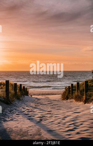 Sandy path the sunset on Grange Beach, South Australia Stock Photo