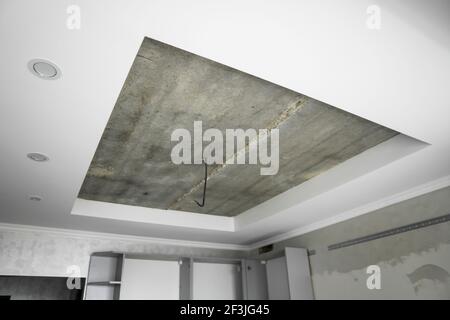 The ceiling in the kitchen is prepared for the installation of a stretch ceiling. Stock Photo