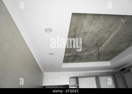 The ceiling in the kitchen is prepared for the installation of a stretch ceiling. Stock Photo