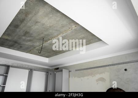 The ceiling in the kitchen is prepared for the installation of a stretch ceiling. Stock Photo