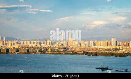 Kunming skyline at sunset in Yunnan China Stock Photo