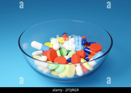 3d illustration of multicolored and differently shaped pills, capsules in a large glass cup on a blue background Stock Photo