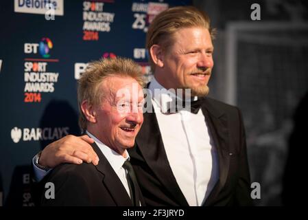 Denis Law and Peter Schmeichel arrive at the BT Sport Industry Awards 2014 at Battersea Evolution - London Stock Photo