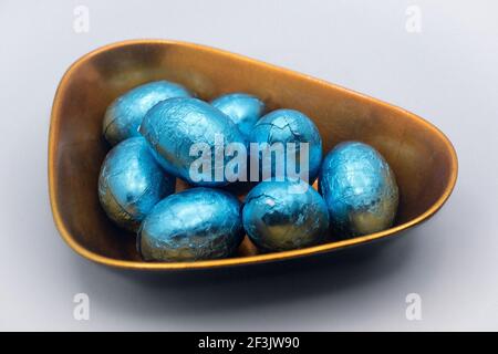 Chocolate Easter eggs in the lacquer bowl Stock Photo