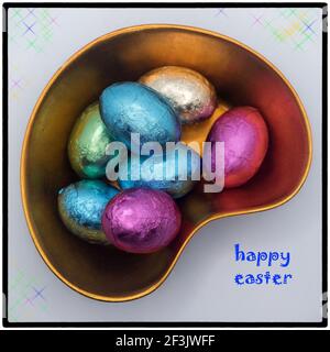 Easter chocolate eggs in the lacquer bowl with Happy Easter message Stock Photo