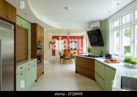 Spacious modern kitchen with view to dining room Stock Photo