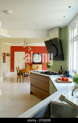 Contemporary Art Deco style walnut and mint Kitchen refurbishment Stock Photo