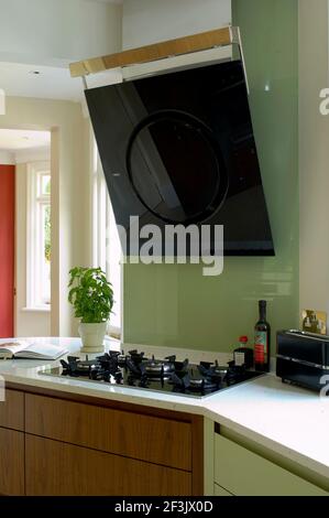 Contemporary Art Deco style walnut and mint Kitchen refurbishment Stock Photo