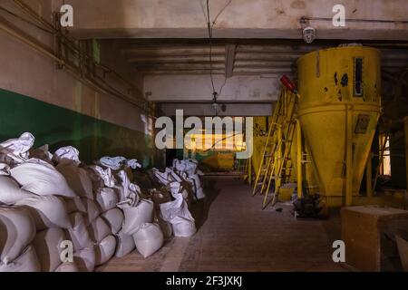 Abandoned bakery. Old rusty equipment in abandoned factory. Stock Photo