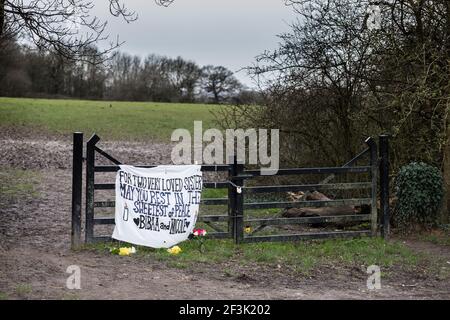 Fryent Park, Wembley Park, UK. 17th March 2021.  As we focus on the murder of Sarah Everard, Alina Wahab and Fawwaz Noibi have set up a memorial to two sisters murdered last June.   The bodies of Nicole Smallman, 27, and Bibaa Henry, 46, were found in Fryent Park in Wembley on 7 June, two days after they went missing following a birthday party in the park.   13 Metropolitan Police officers were suspended for sharing inappropriate images, including selfies of themselves with the sisters bodies, via WhatsApp, but have still not been charged.  Amanda Rose/Alamy Live News Stock Photo