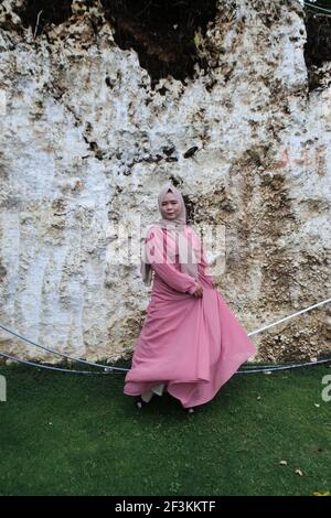 DENPASAR, INDONESIA - Dec 12, 2020: Muslim girl in hijab, Bali, Indonesia, December 12, 2020 Stock Photo