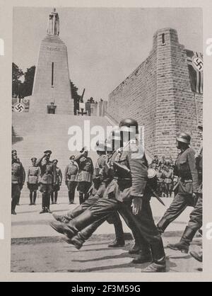 World War II from German propaganda news. Parade of Wehrmacht soldiers in occupied Verdun. France. 1940 Stock Photo